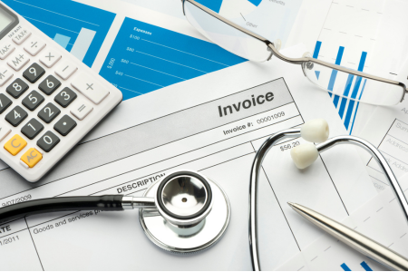 checklist of documents and financial records organized on a desk, ready for an audit