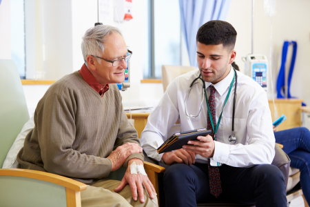 doctor and patient discussing in a hospital room